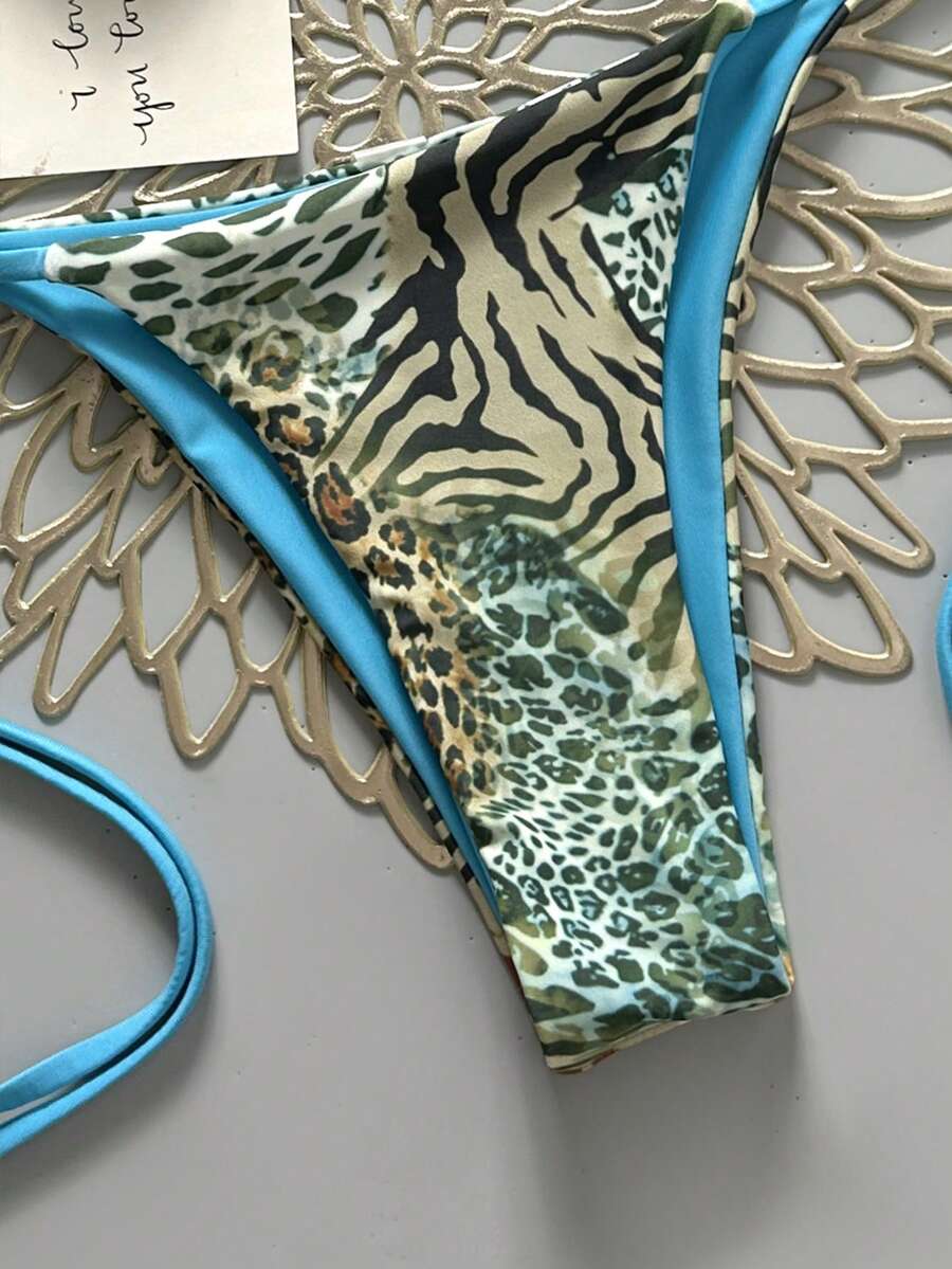 Women's vintage leopard print 2-piece bikini set featuring a high waist tie-side bottom and a halter neck triangle top.