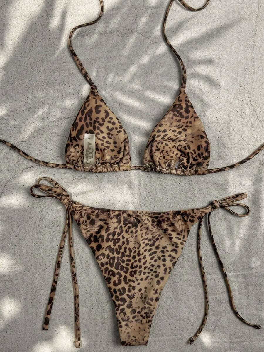 Women's high waist 2-piece triangle bikini set featuring colorblock trim, halter neckline, wireless bra with removable padding, and tie-side bottoms.