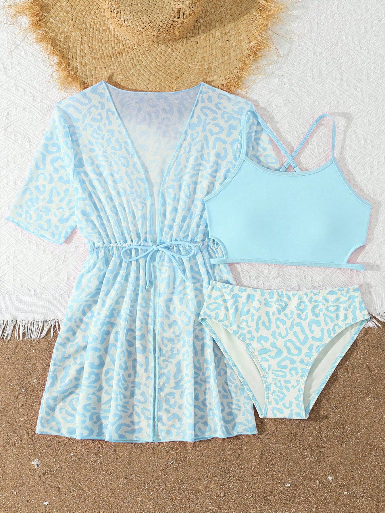 Tween girls 3-piece striped swimwear set featuring a tankini top, mid-waist bikini bottoms with a drawstring waist, and a matching kimono cover-up for beach or vacation wear.