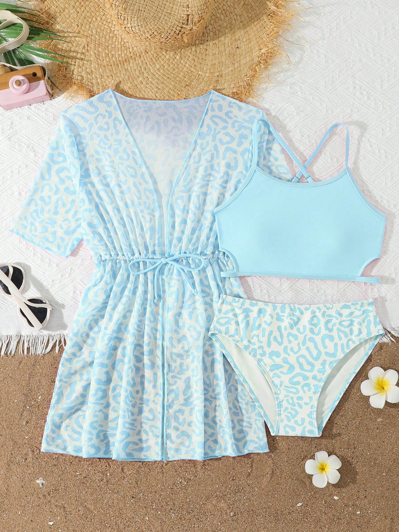 Tween girls 3-piece striped swimwear set featuring a tankini top, mid-waist bikini bottoms with a drawstring waist, and a matching kimono cover-up for beach or vacation wear.