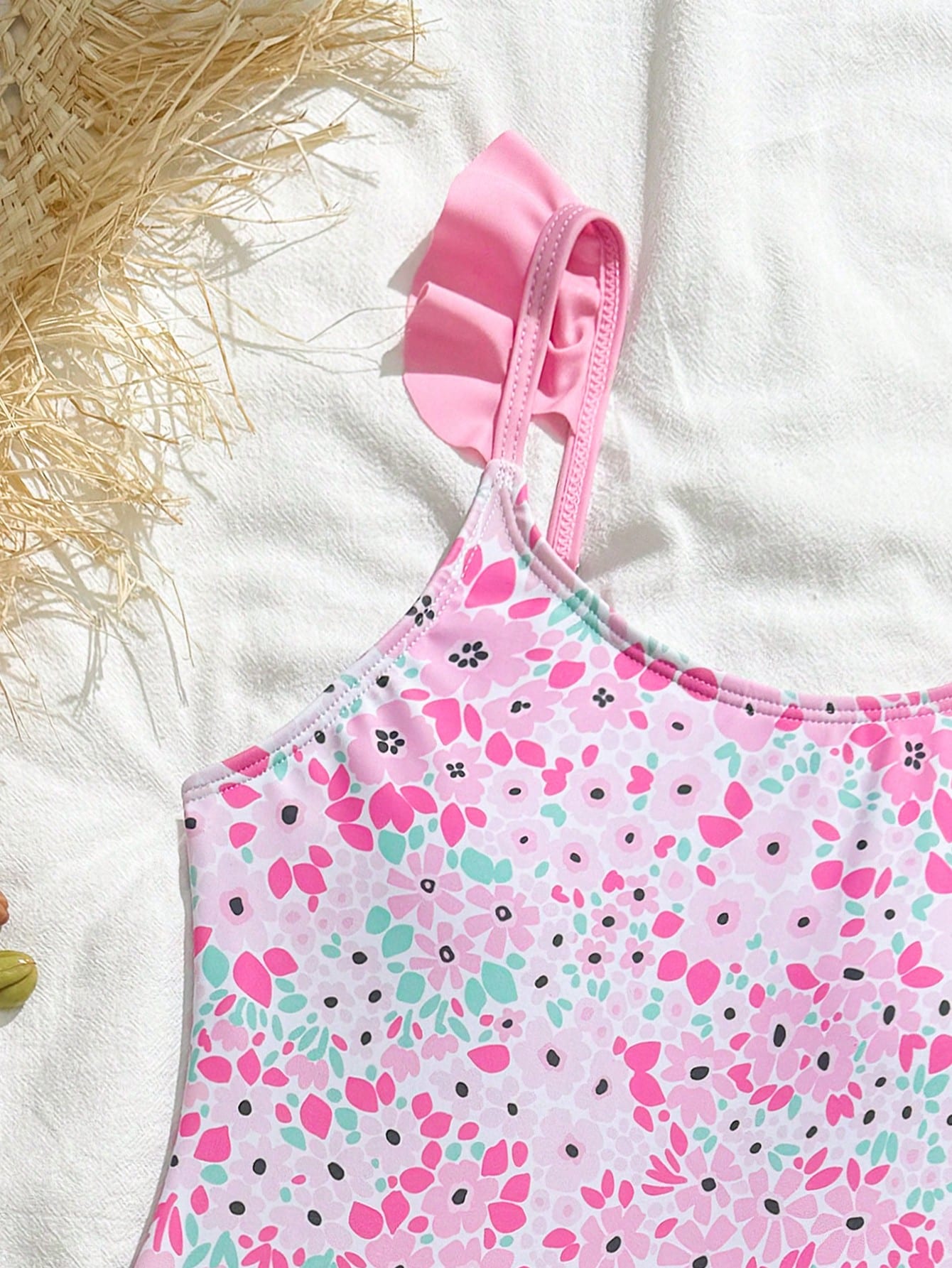 Tween girls one-piece swimsuit in leopard print with ruffle shoulder straps, scoop neckline, fitted shape, and attached ruffle hem skirt; sleeveless, mid-waist skirt bottom, and lined body for swimming, vacation, and summer beach wear.