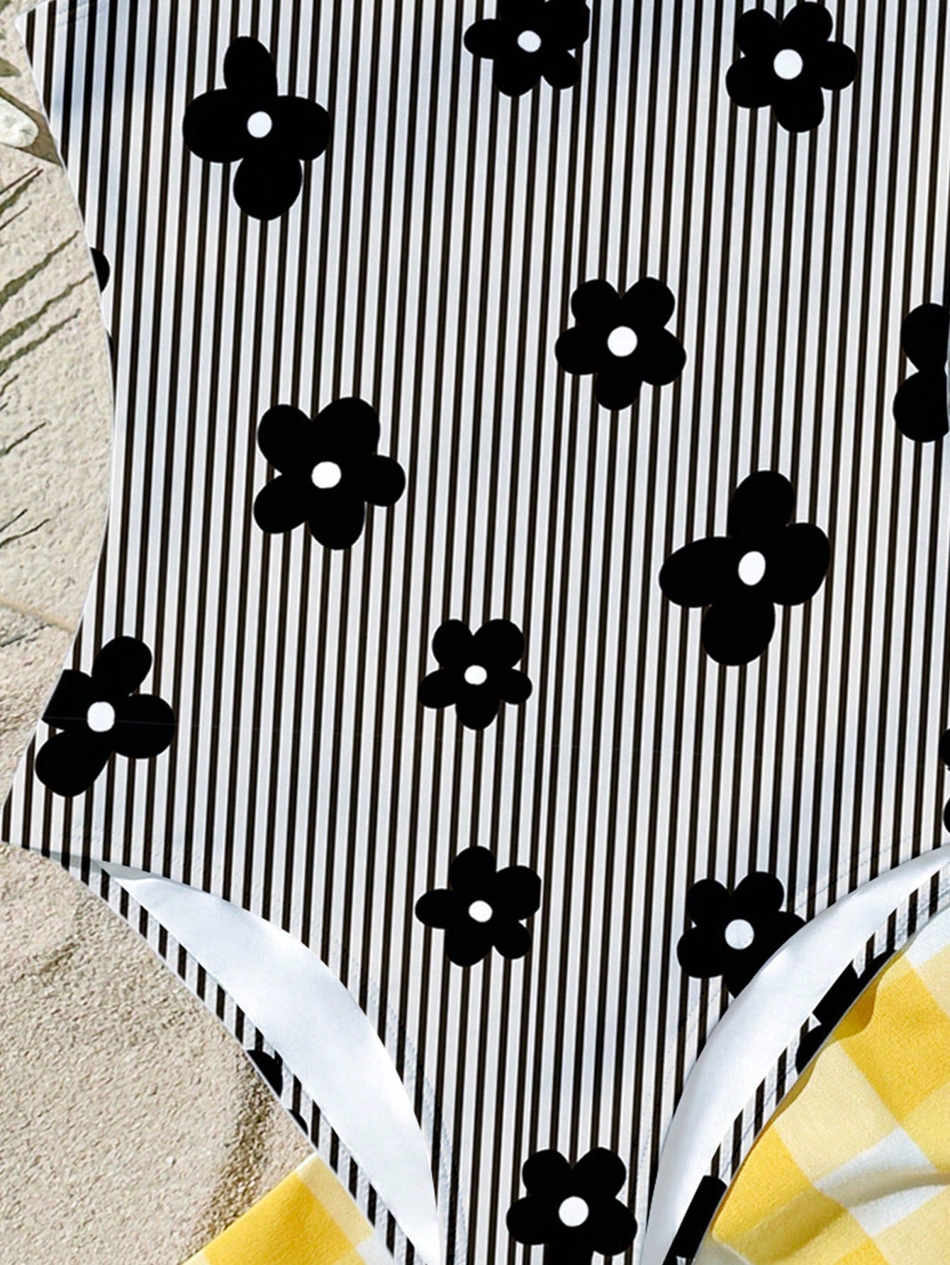 Multicolor tween girls one-piece swimsuit with all-over print, scoop neck, fitted camisole style, and lined body for summer beach vacations.
