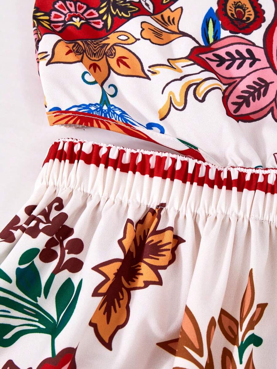 Tween girls floral halter dress with backless sleeveless design, belted high waist, shirred details, appliques, and flared A-line midi silhouette for summer vacation or graduation outfit.