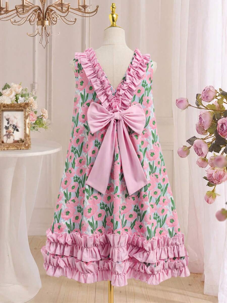 Tween girls sleeveless tropical floral mini dress in black with round neck and ruffle hem detail