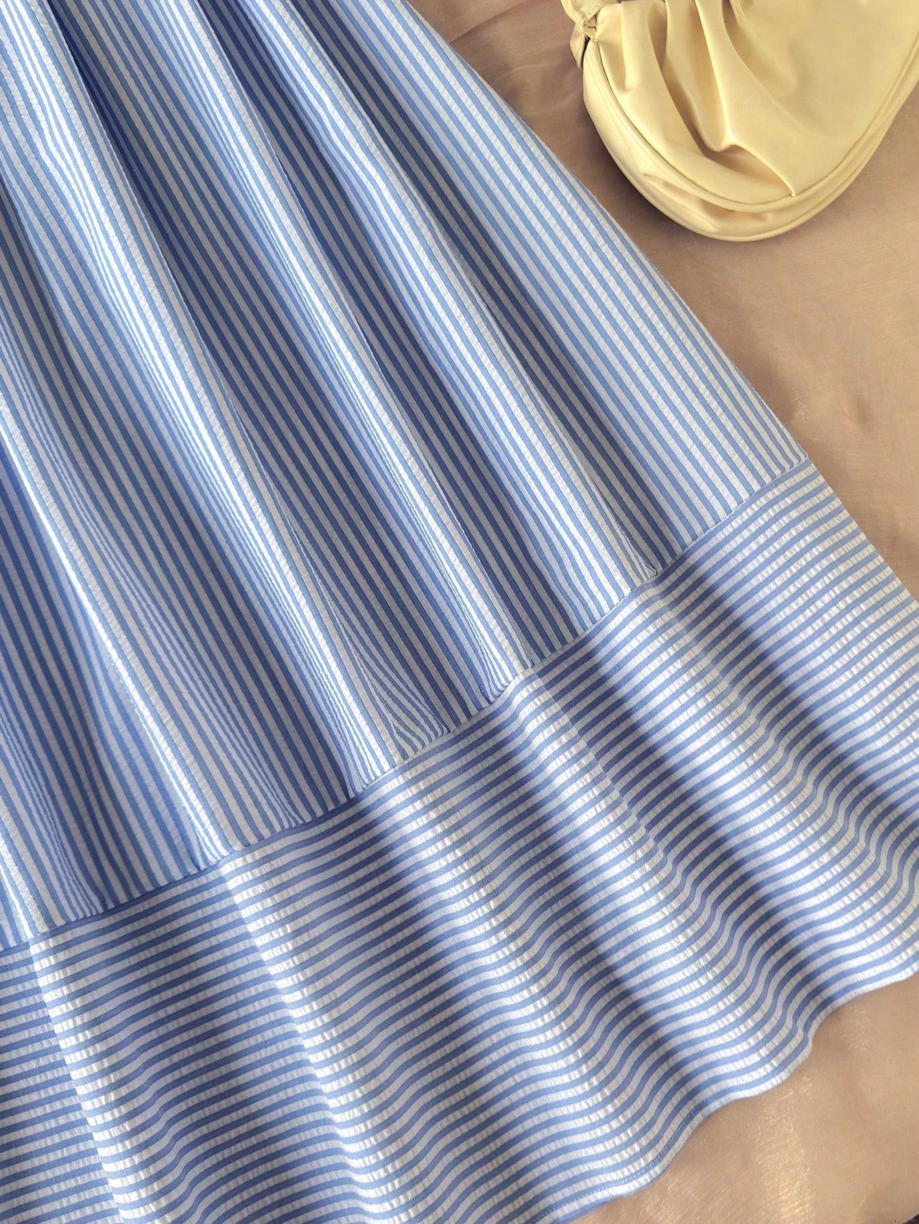 Tween girls striped spaghetti strap cami dress with high waist, shirred detail, zipper closure, sleeveless design, and flared long A-line silhouette for vacation wear.