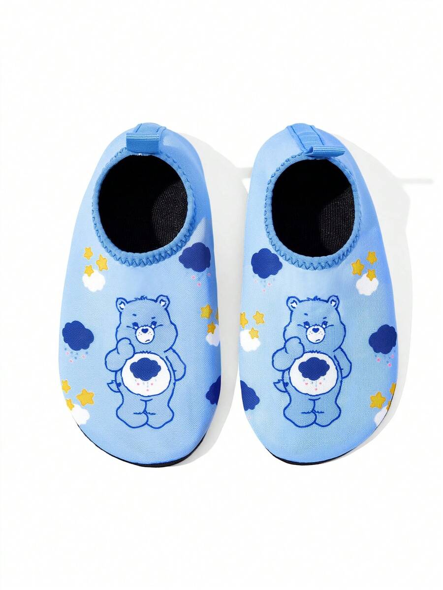 Girls cartoon pattern non-slip water shoes with slip-on closure and durable TPR outsole for beach and outdoor sports.