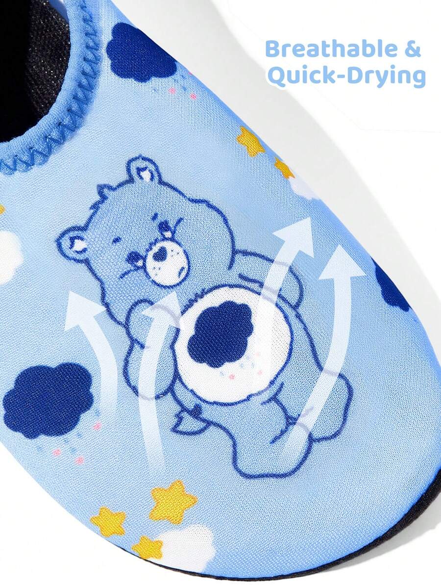 Girls cartoon pattern non-slip water shoes with slip-on closure and durable TPR outsole for beach and outdoor sports.