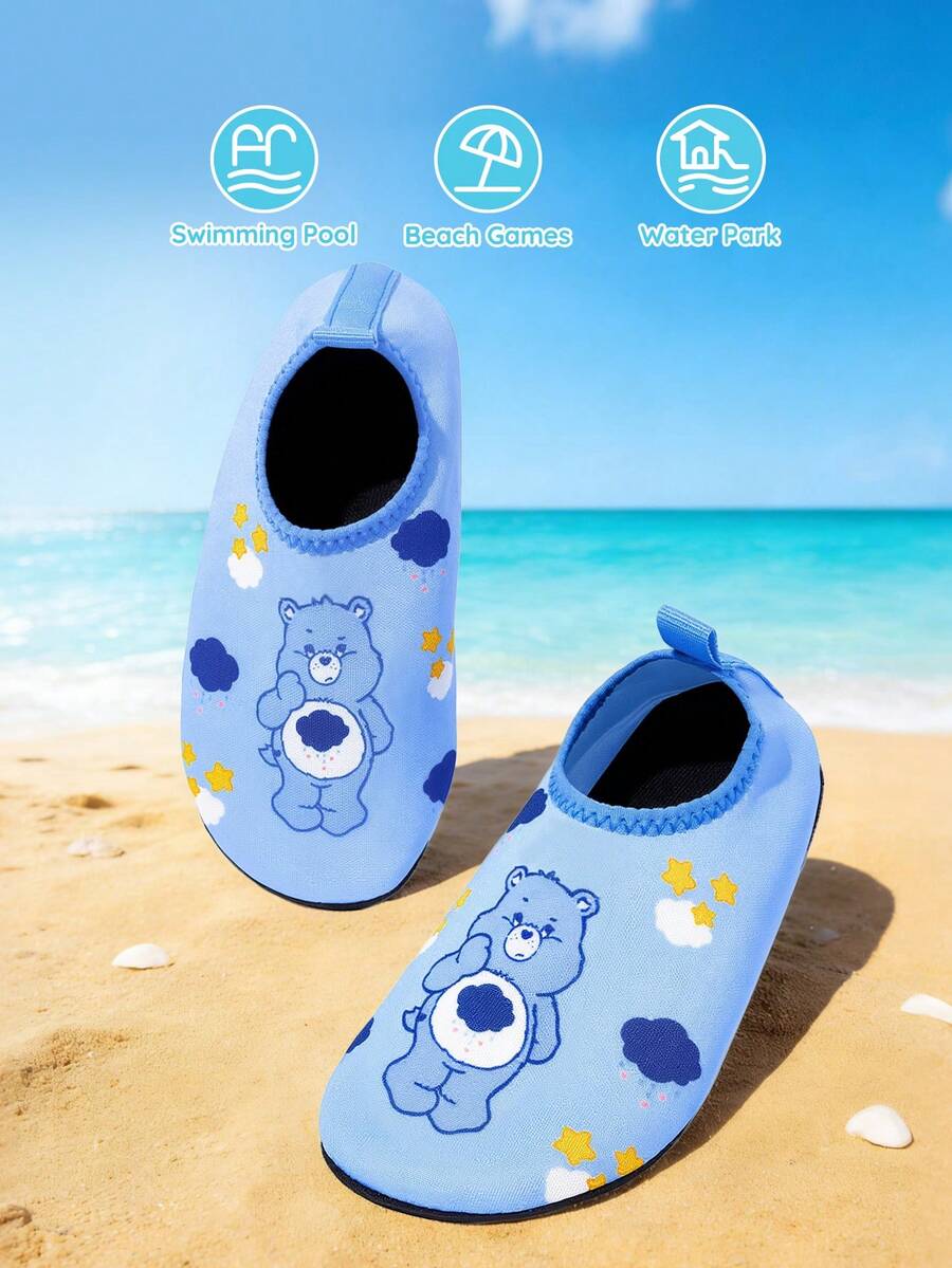 Girls cartoon pattern non-slip water shoes with slip-on closure and durable TPR outsole for beach and outdoor sports.