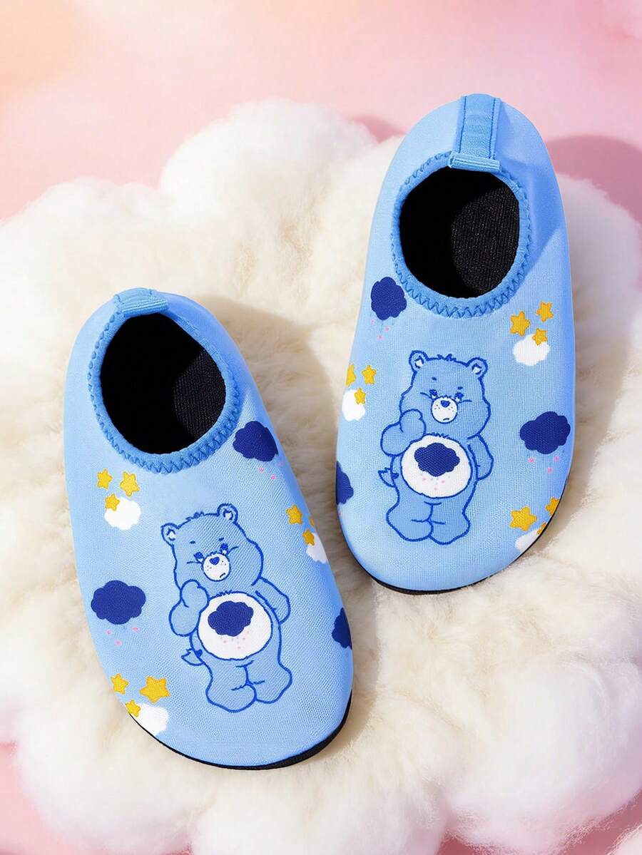 Girls cartoon pattern non-slip water shoes with slip-on closure and durable TPR outsole for beach and outdoor sports.