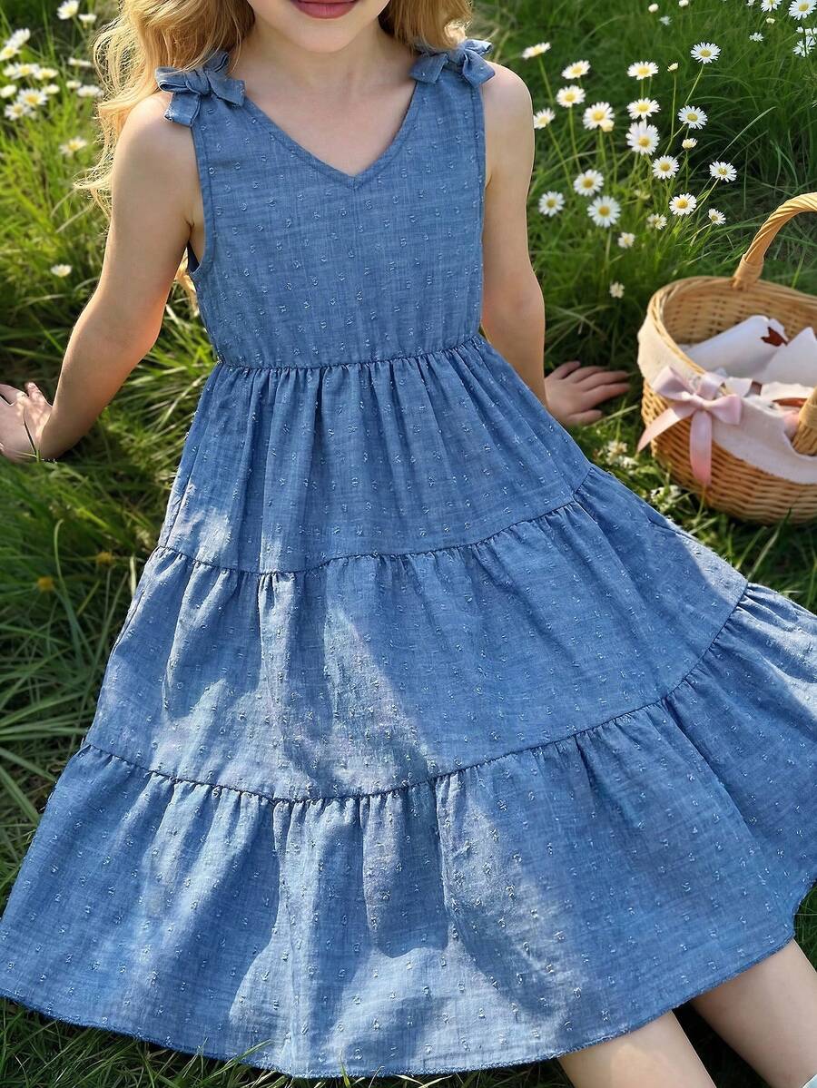 Girls sleeveless blue tiered dress featuring a V-neckline, high waist, and A-line skirt.