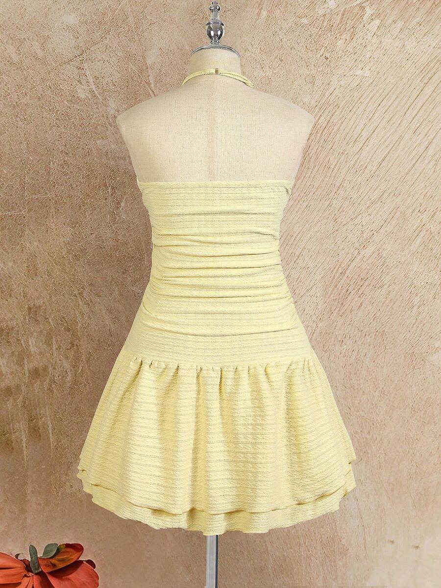 Tween girls apricot sleeveless halter mini dress with textured starfish and shell decor, shirred tiered layer, high waist, and flounce hem.