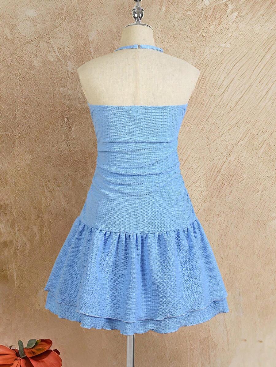 Tween girls apricot sleeveless halter mini dress with textured starfish and shell decor, shirred tiered layer, high waist, and flounce hem.