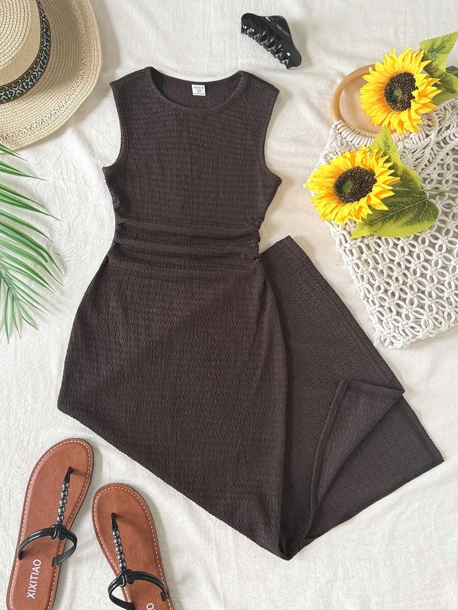 Tween girls sleeveless midi tank dress with round neck, graphic pattern, slim fit waist, slit hem, and apricot color styling for casual and occasion wear.