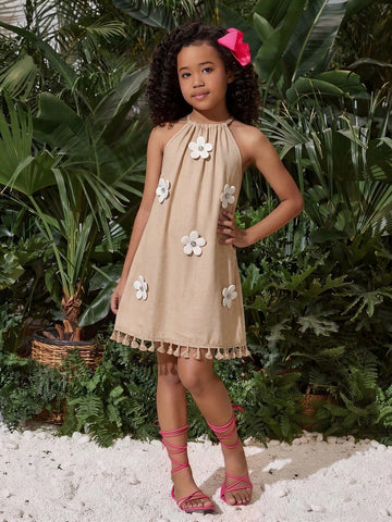 Tween girls floral print dress with halter neckline, sleeveless cold shoulder design, A-line shape, and vacation style.