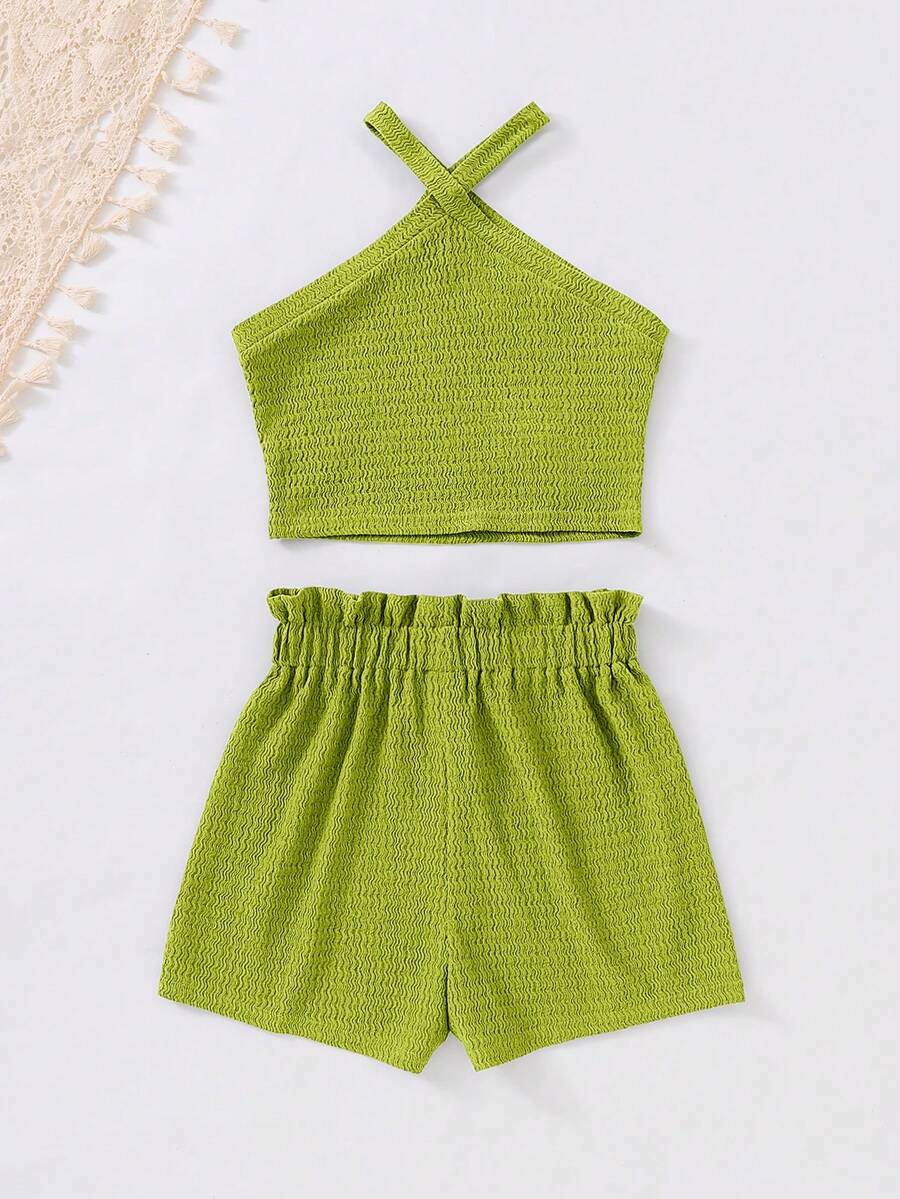 Tween girl 2-piece casual outfit set featuring a solid beige knit halter sleeveless top with belted detail and matching shorts.