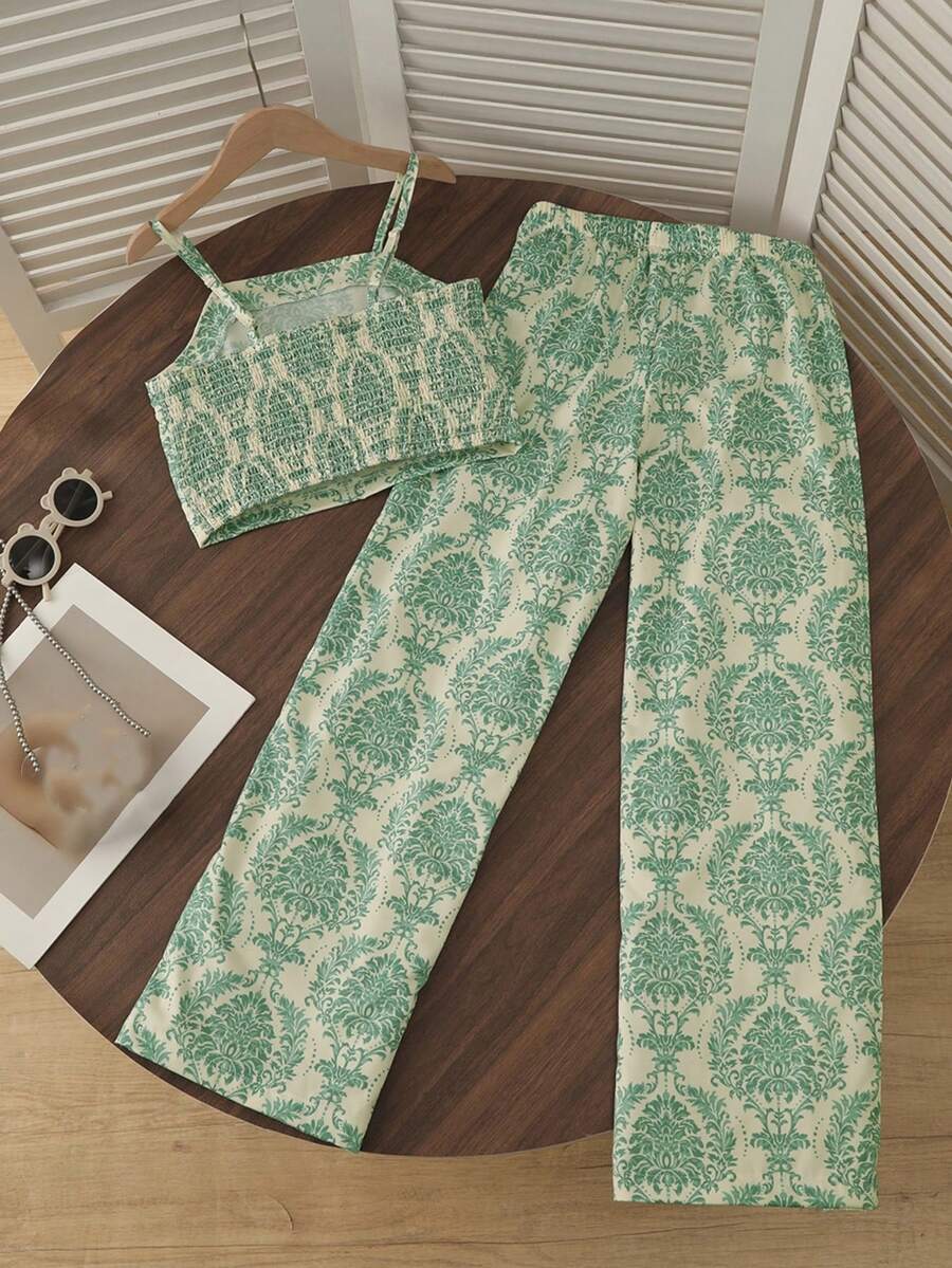 Tween girls casual 2-piece set featuring an apricot woven camisole crop top with back shirring and matching high-waisted loose long pants.