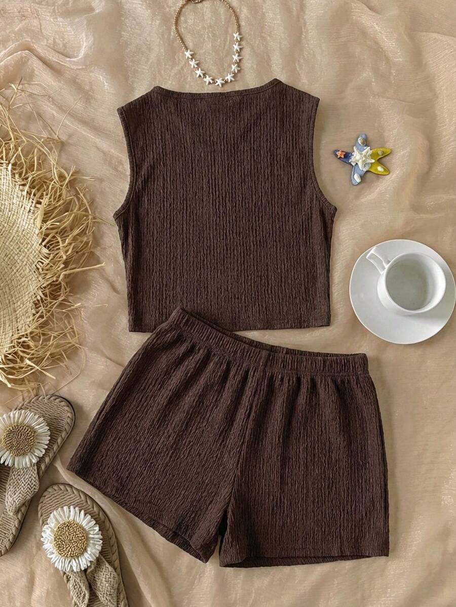 Tween girls black rib-knit round neck slim fit top and textured shorts casual summer set.