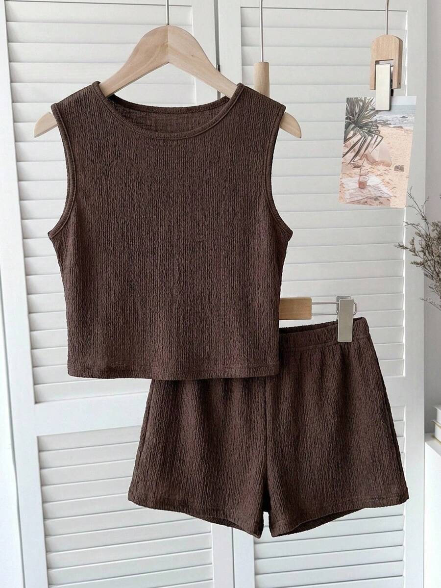 Tween girls black rib-knit round neck slim fit top and textured shorts casual summer set.