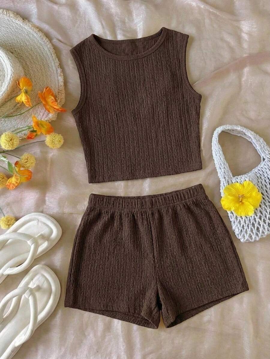 Tween girls black rib-knit round neck slim fit top and textured shorts casual summer set.