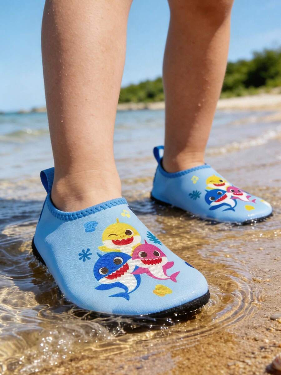 Girls cartoon pattern non-slip water shoes with slip-on closure and durable TPR outsole for beach and outdoor sports.