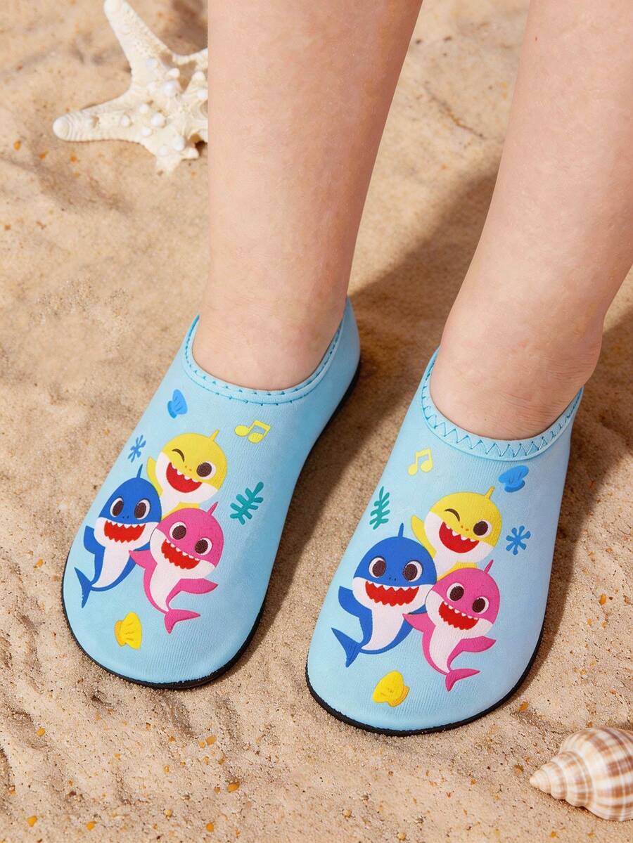 Girls cartoon pattern non-slip water shoes with slip-on closure and durable TPR outsole for beach and outdoor sports.