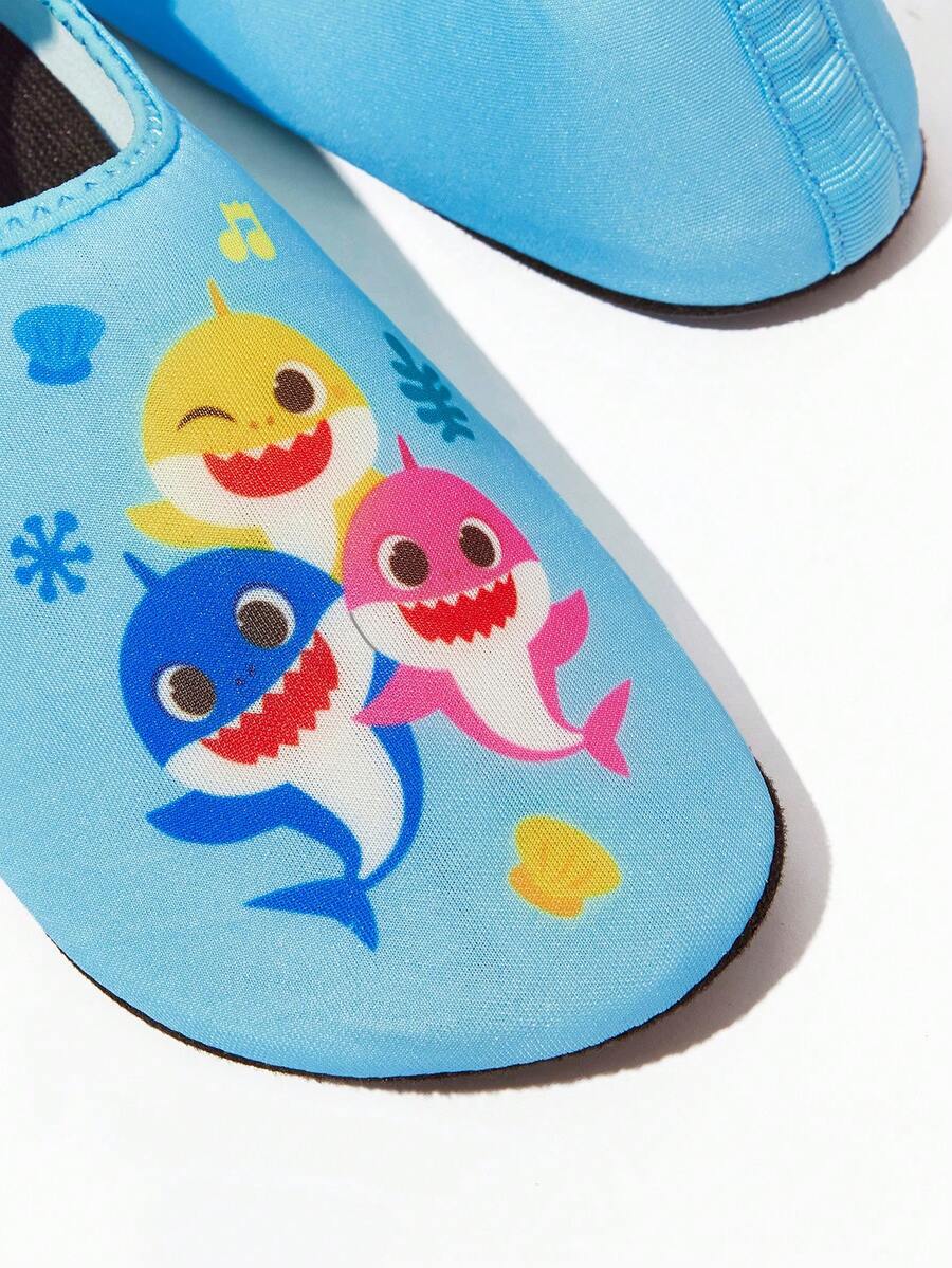 Girls cartoon pattern non-slip water shoes with slip-on closure and durable TPR outsole for beach and outdoor sports.