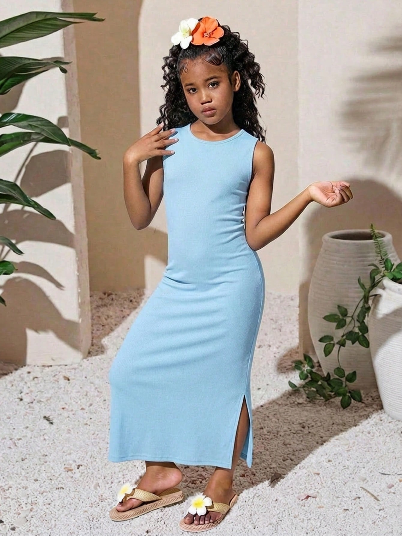 Tween girls sleeveless midi tank dress with round neck, graphic pattern, slim fit waist, slit hem, and apricot color styling for casual and occasion wear.