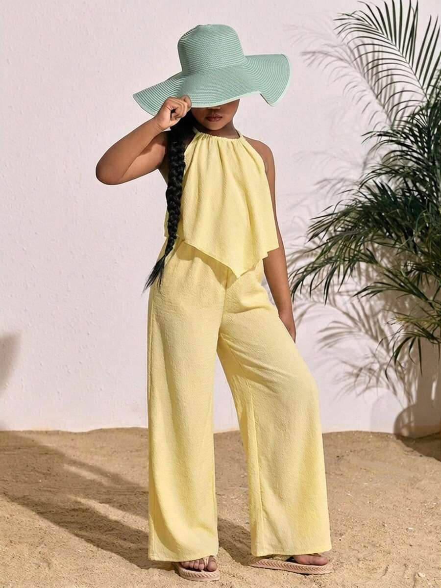 Tween girls casual apricot striped two-piece set featuring a sleeveless halter short top with curved hem and matching long pants.
