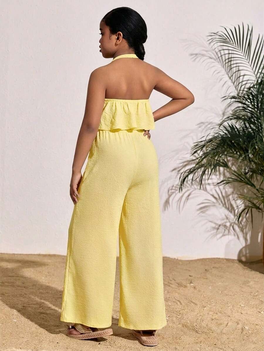 Tween girls casual apricot striped two-piece set featuring a sleeveless halter short top with curved hem and matching long pants.