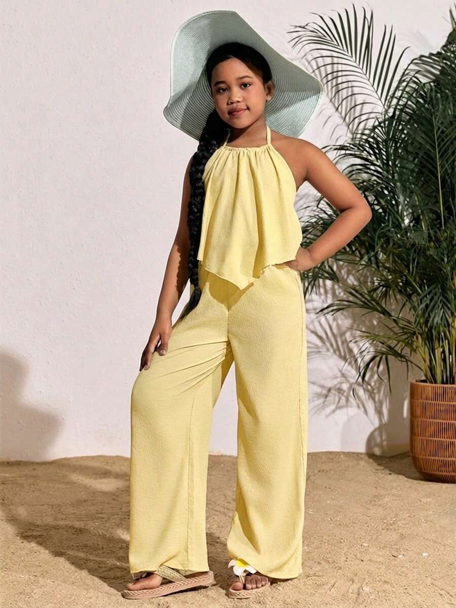 Tween girls casual apricot striped two-piece set featuring a sleeveless halter short top with curved hem and matching long pants.