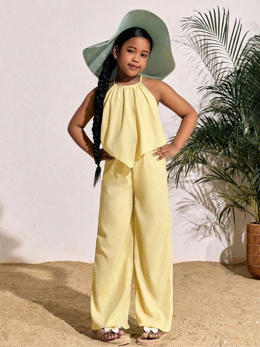 Tween girls casual apricot striped two-piece set featuring a sleeveless halter short top with curved hem and matching long pants.