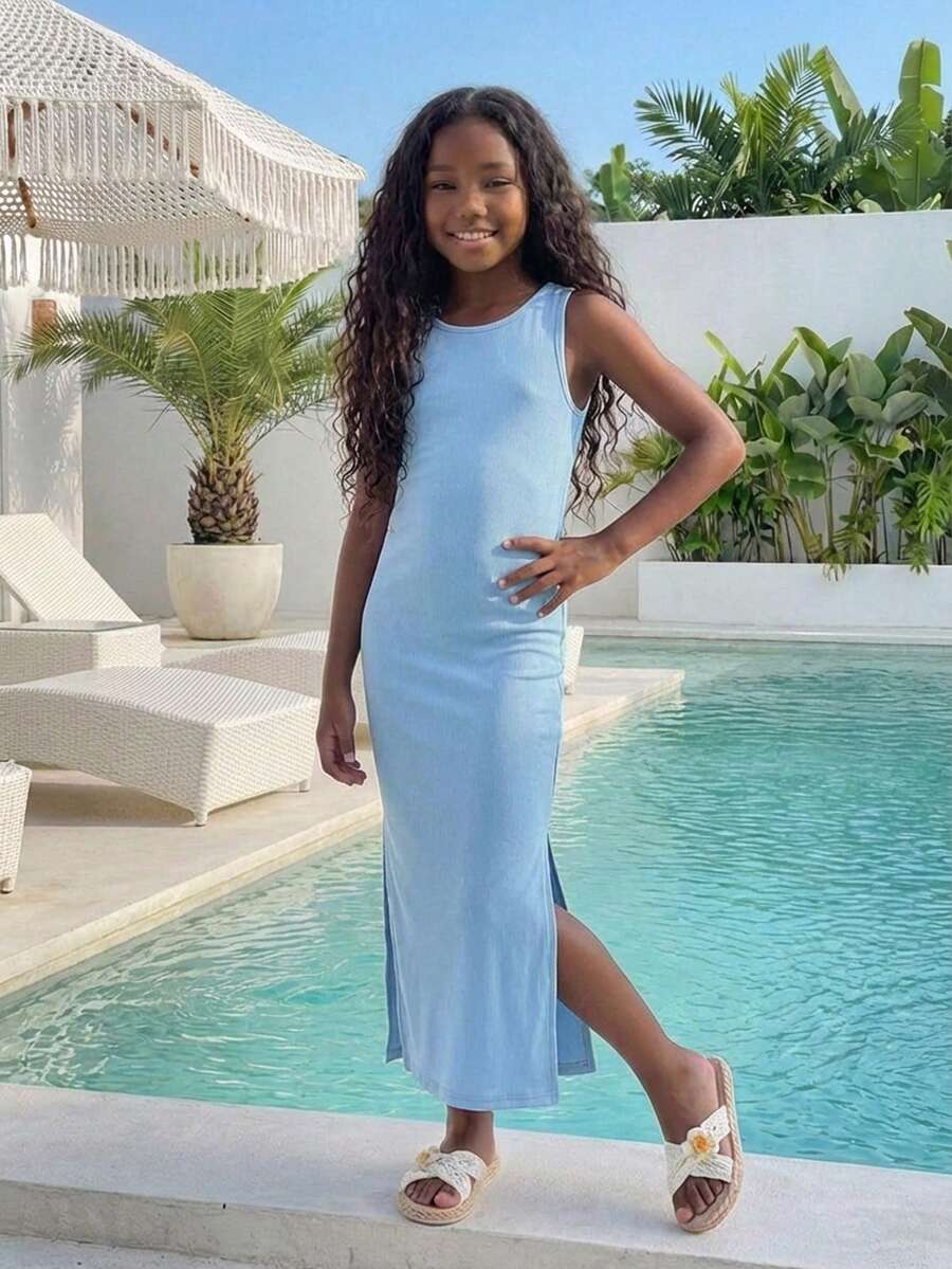 Tween girls sleeveless midi tank dress with round neck, graphic pattern, slim fit waist, slit hem, and apricot color styling for casual and occasion wear.