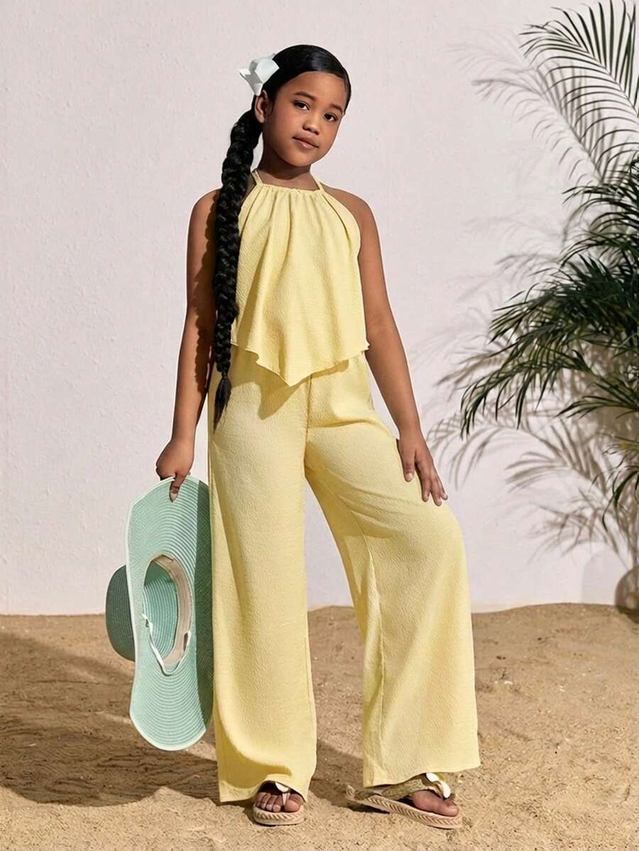 Tween girls casual apricot striped two-piece set featuring a sleeveless halter short top with curved hem and matching long pants.
