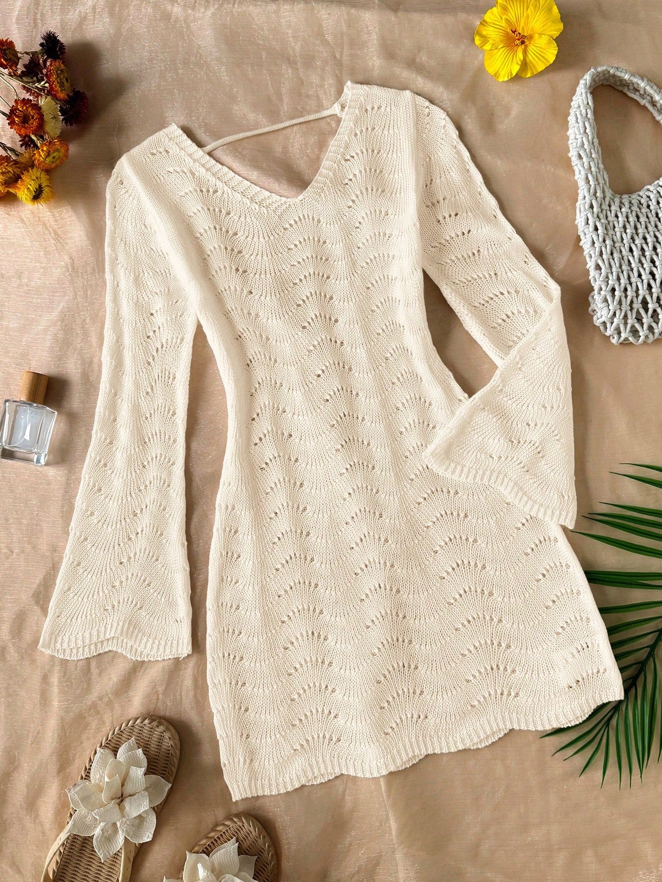 Girls semi-sheer beach cover-up dress with V-neckline, long sleeves, backless side-tie design, and asymmetrical hem for tween summer beach vacations.