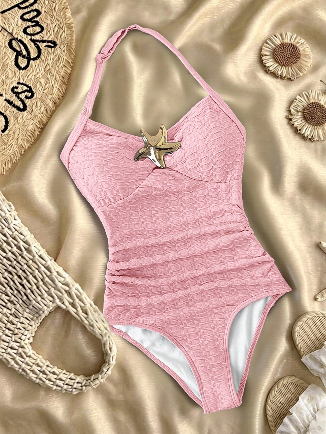 Tween girls one-piece swimsuit with polka dot-inspired all-over print, bow detail, spaghetti strap halter neckline, and lined stretch fabric for beach or vacation wear