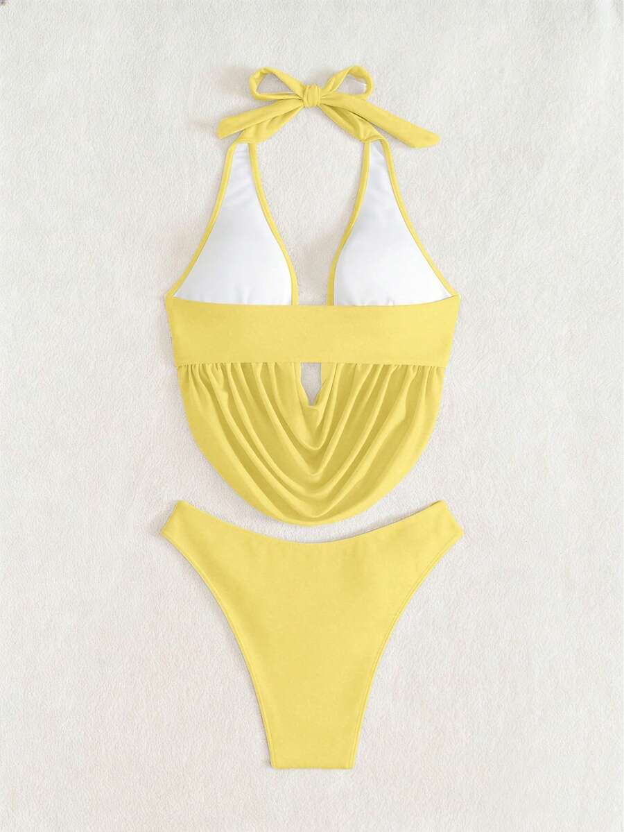 Women's 2-piece bikini set featuring a black deep V-neck lace-up crop top and high cut bikini bottom for beach and vacation wear.
