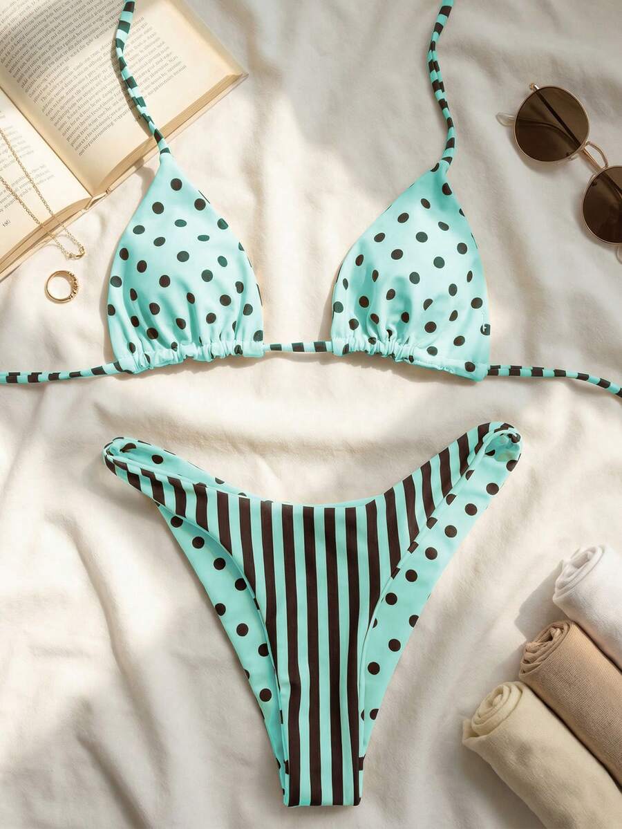 Women's two-piece halter bikini set featuring high cut thong bottoms and removable padding