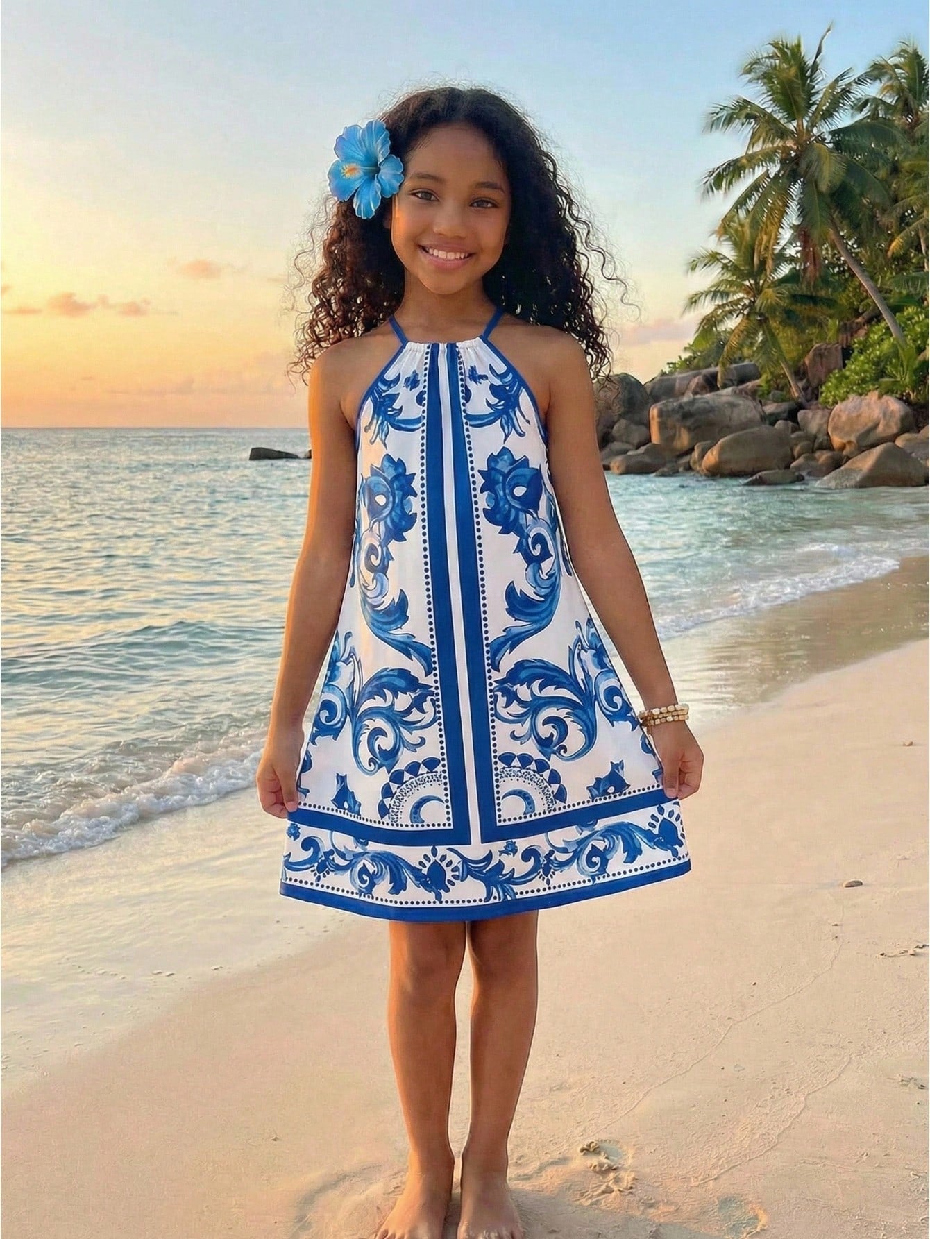 Tween girls floral halter neck sleeveless tunic dress with button detail, plant pattern, loose fit, short length, and vacation style for casual summer wear.