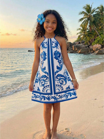 Tween girls floral halter neck sleeveless tunic dress with button detail, plant pattern, loose fit, short length, and vacation style for casual summer wear.