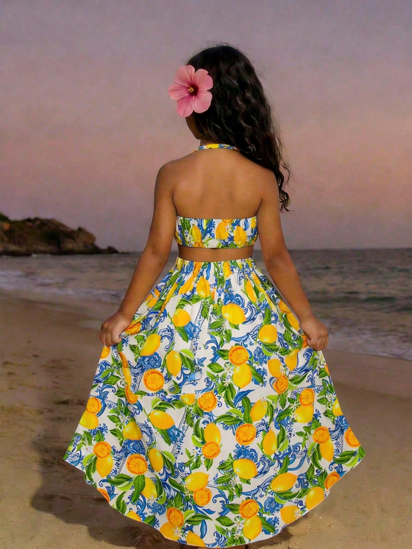 Tween girls floral halter dress with backless sleeveless design, belted high waist, shirred details, appliques, and flared A-line midi silhouette for summer vacation or graduation outfit.