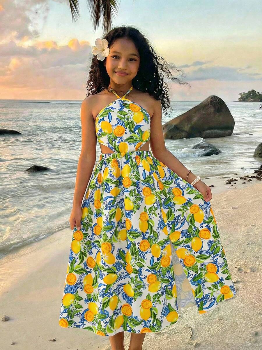 Tween girls floral halter dress with backless sleeveless design, belted high waist, shirred details, appliques, and flared A-line midi silhouette for summer vacation or graduation outfit.