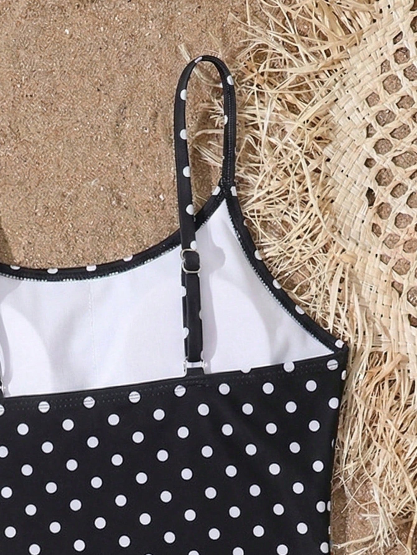 Tween girls one-piece swimsuit with multicolor ocean shell and seahorse all-over print, spaghetti straps, cut-out detail, and lined body for beach or swimming.