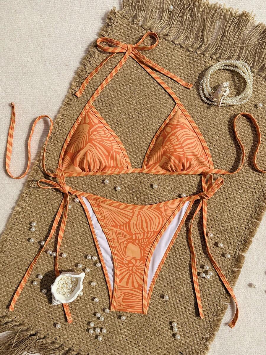 Women's apricot solid halter tie bikini top with triangle cups and matching tie-side swimsuit bottoms.