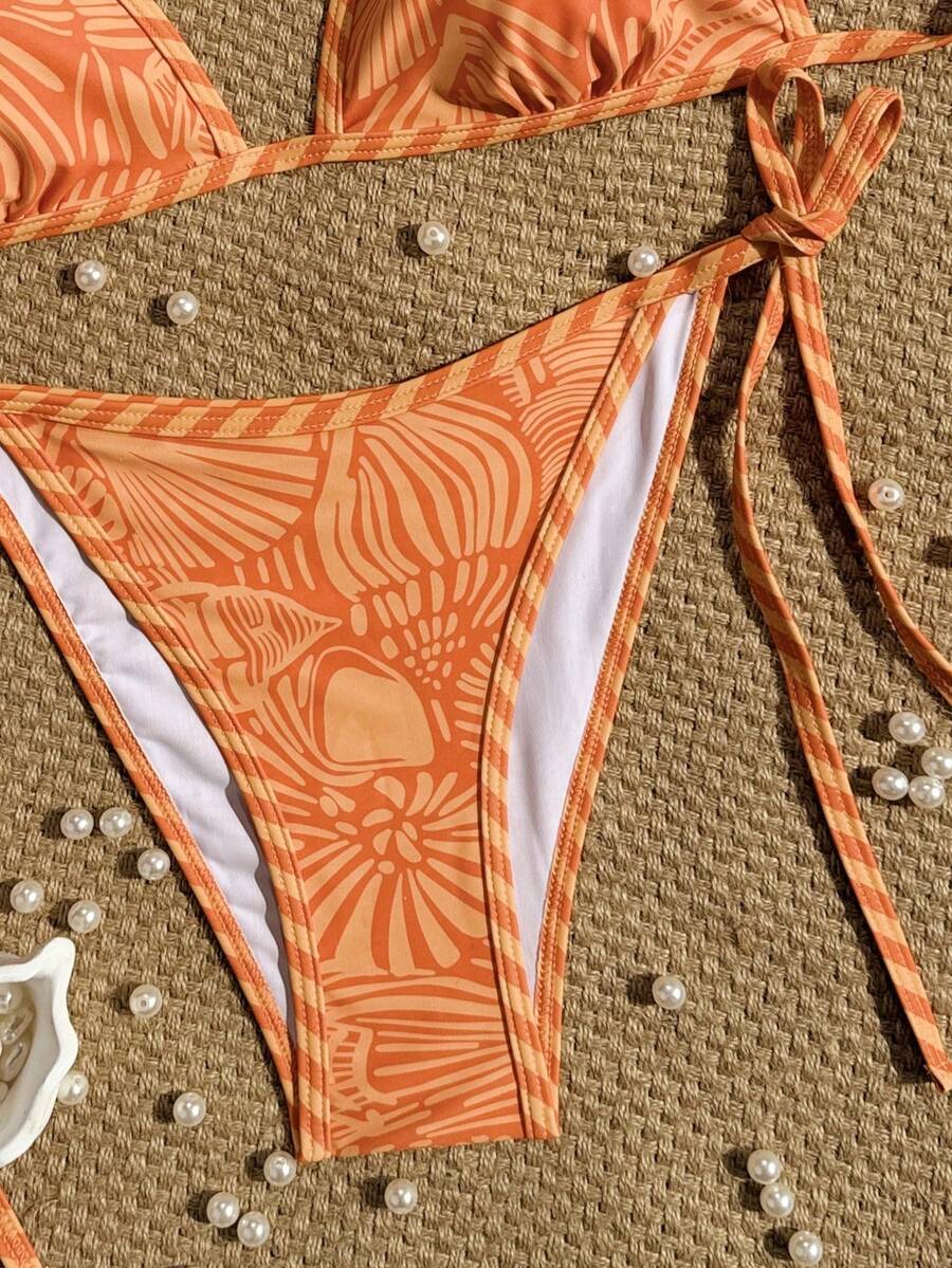 Women's apricot solid halter tie bikini top with triangle cups and matching tie-side swimsuit bottoms.