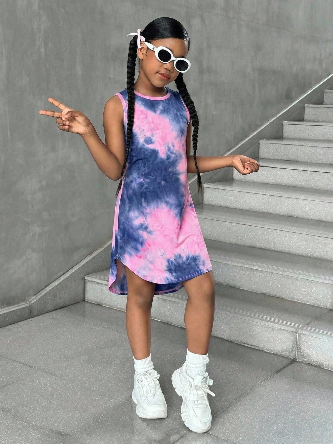 Tween girls sleeveless tie-dye tank dress with round neck, loose fit, short length, and asymmetrical hem in a casual streetwear style