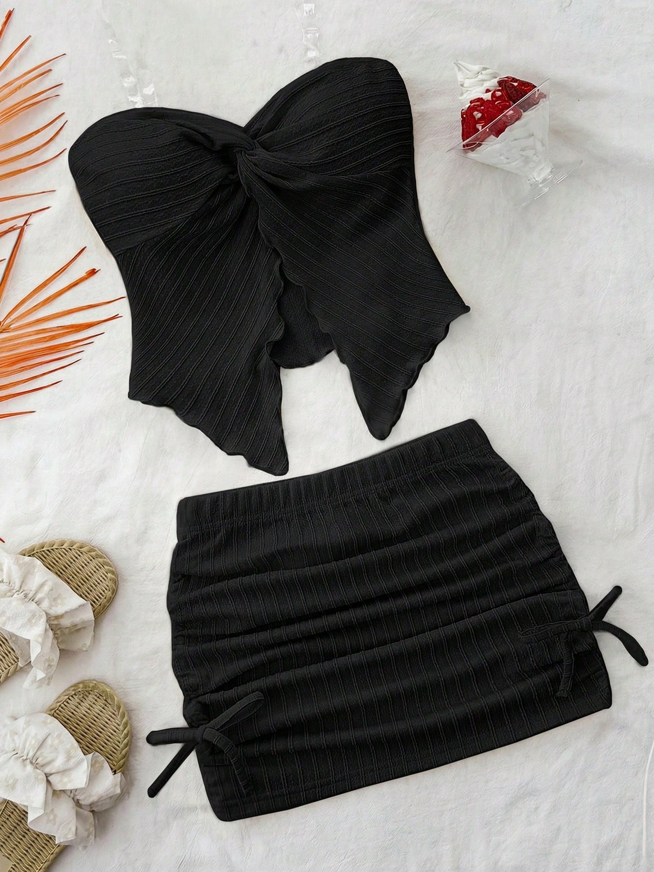 Tween girls apricot two-piece set featuring a spaghetti strap tank top and skirt with ruched lettuce trim.