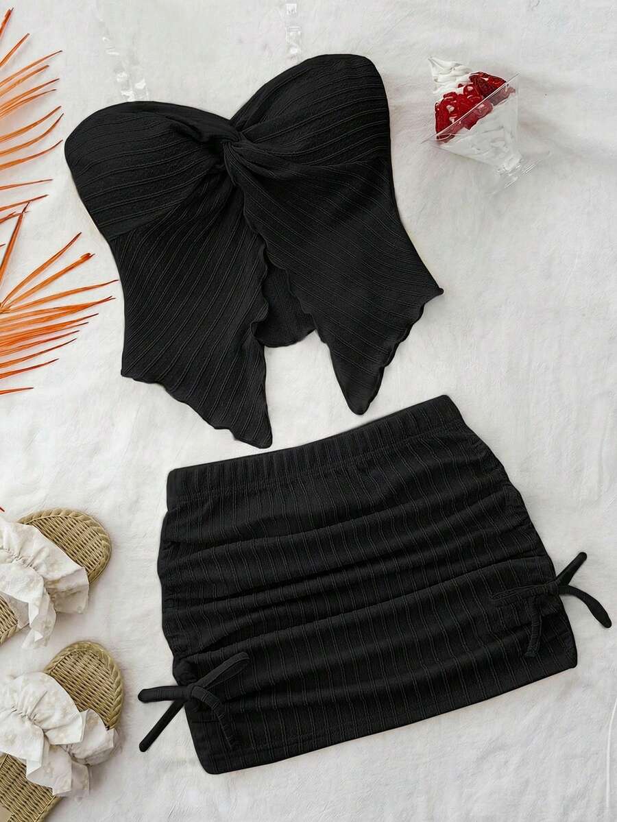 Tween girls apricot two-piece set featuring a spaghetti strap tank top and skirt with ruched lettuce trim.