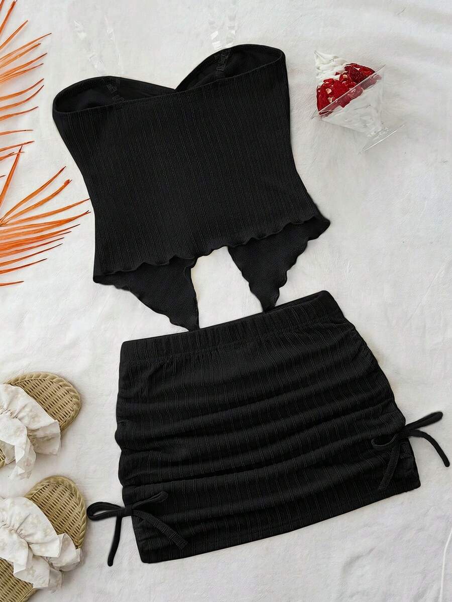 Tween girls apricot two-piece set featuring a spaghetti strap tank top and skirt with ruched lettuce trim.