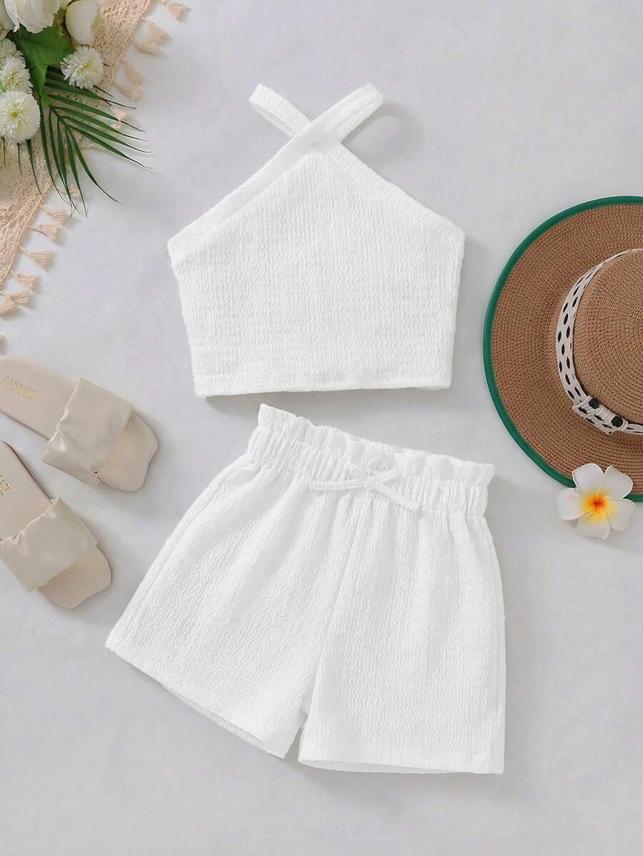 Tween girl 2-piece casual outfit set featuring a solid beige knit halter sleeveless top with belted detail and matching shorts.