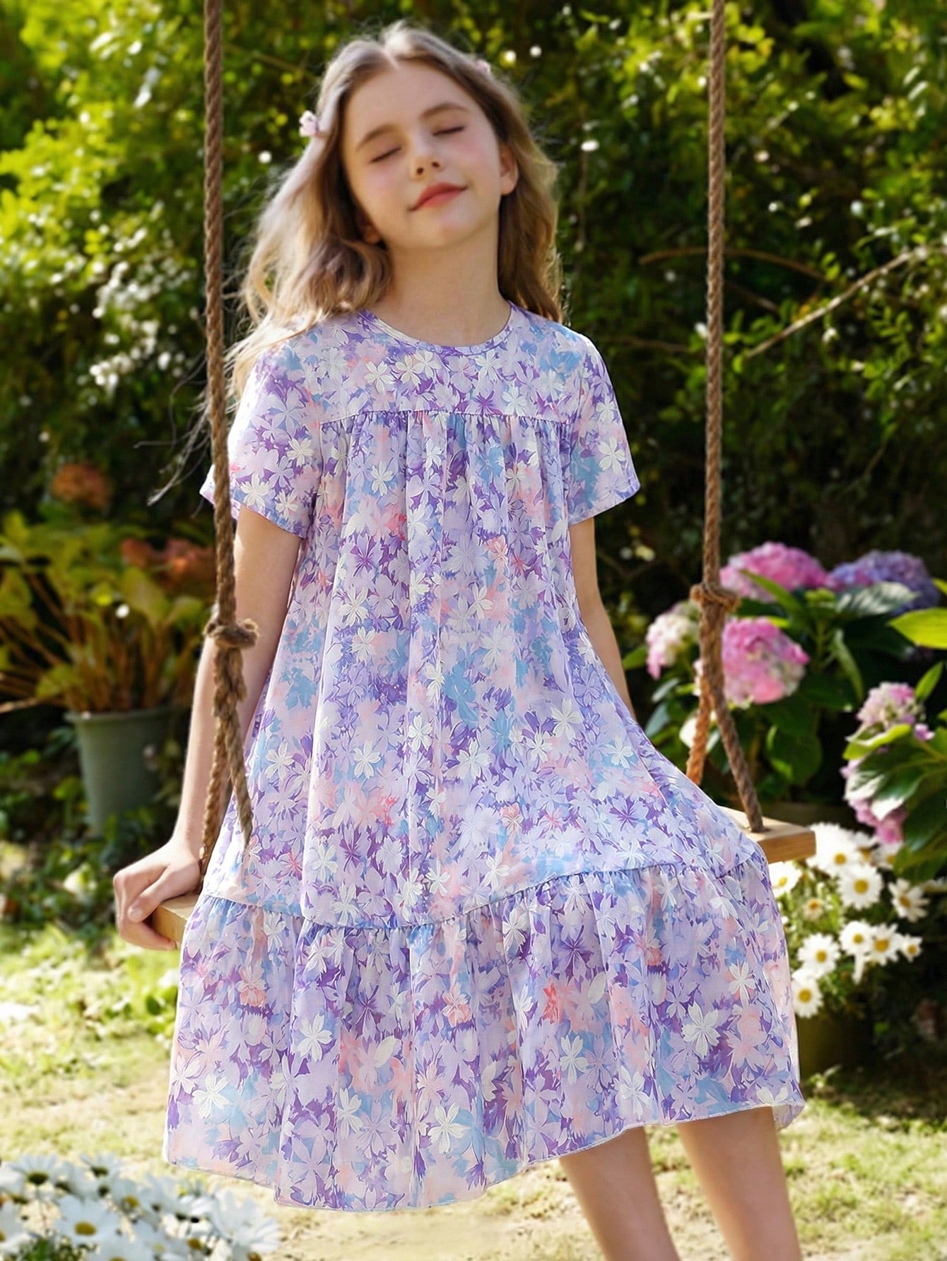 Tween girl wearing an Army Green textured short sleeve smock midi dress with round neck and ruffle flounce hem.